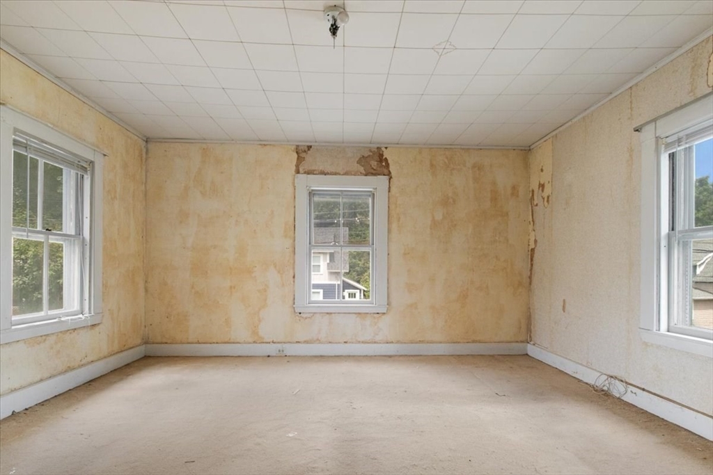 50 Clark Street Dedham, MA 02026 - Photo 28 of 38 an empty room with a window