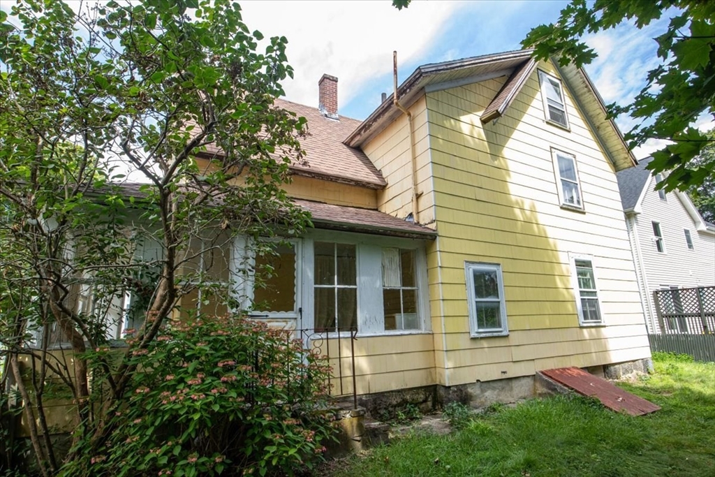 50 Clark Street Dedham, MA 02026 - Photo 32 of 38 a view of a house with a yard