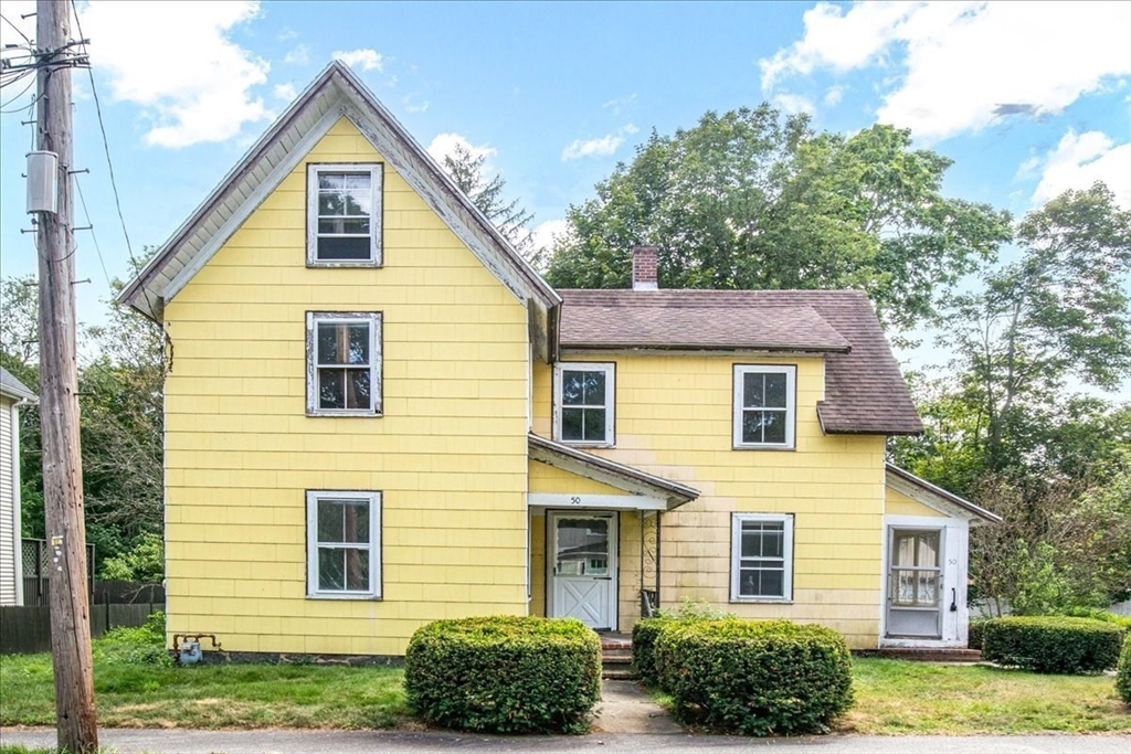 50 Clark Street Dedham, MA 02026 - Photo 34 of 38 a view of a yard in front of a house