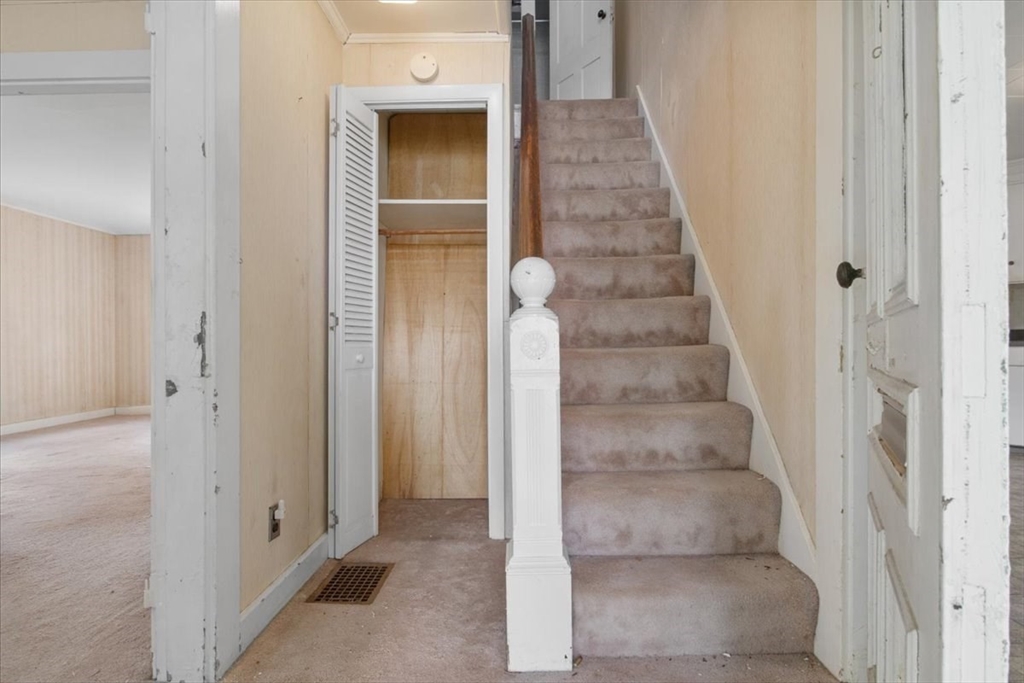 50 Clark Street Dedham, MA 02026 - Photo 10 of 38 a view of staircase with white walls