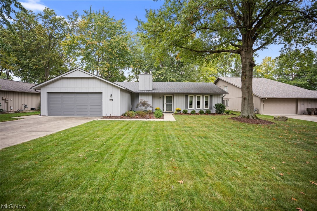 10798 Gate Post Road Strongsville, OH 44149 - Photo 1 of 32 Ranch-style house featuring a front lawn and a garage