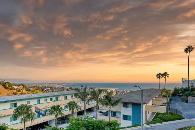 a bed room with a bed and wooden floor