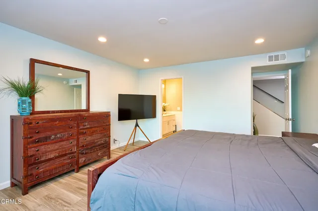 a bathroom with a shower and a tub