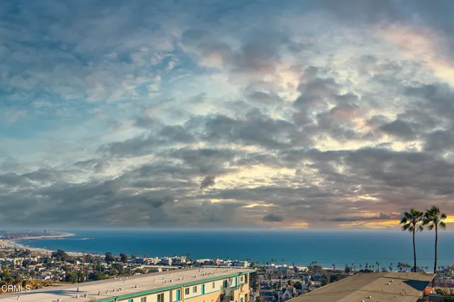 a view of a city with tall buildings