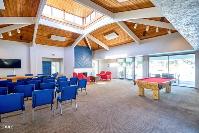 a outdoor dining space with furniture and outdoor view