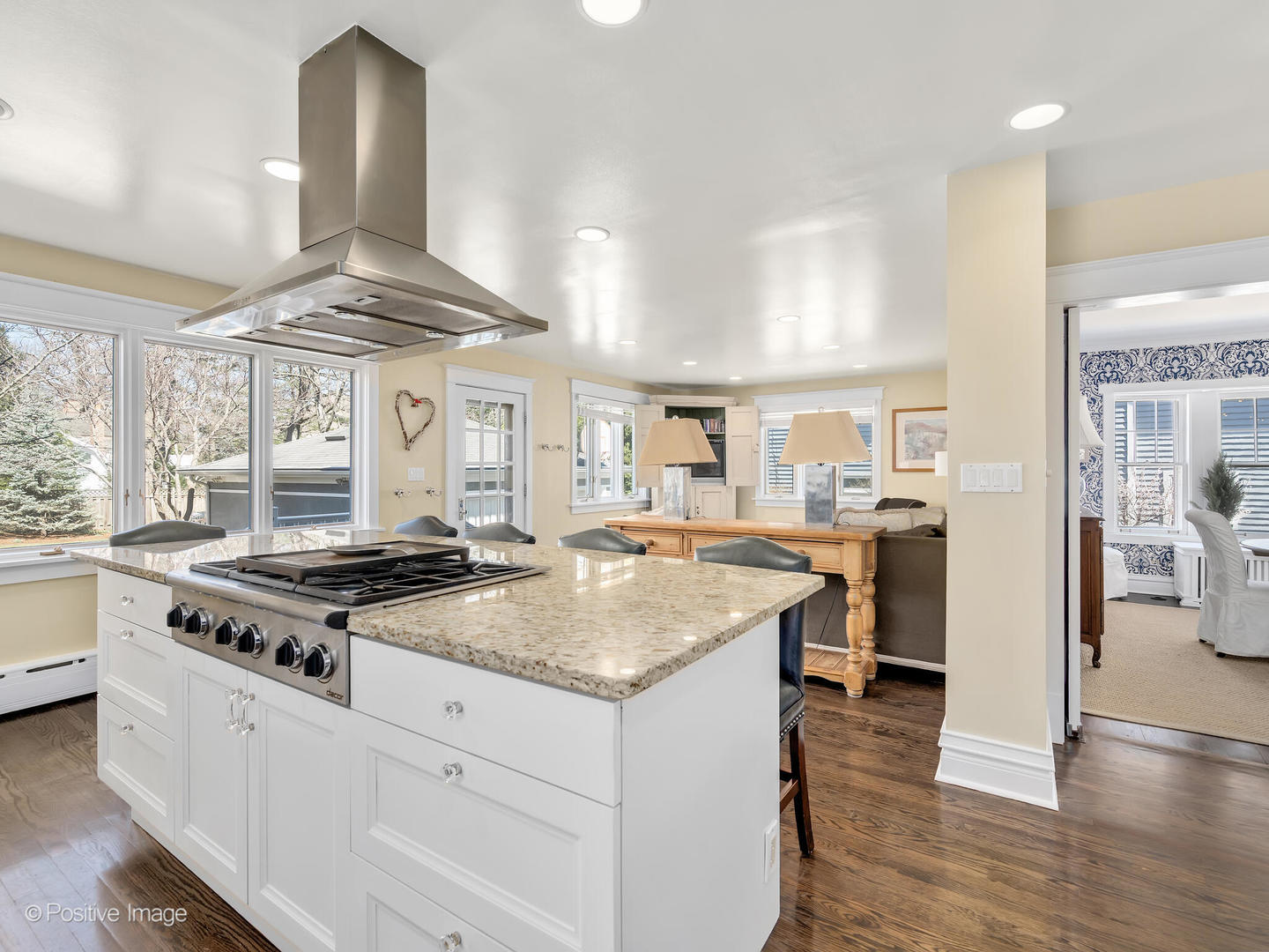 607 Willow Road Winnetka, IL 60093 - Photo 15 of 51 a kitchen with stainless steel appliances granite countertop a stove and a sink