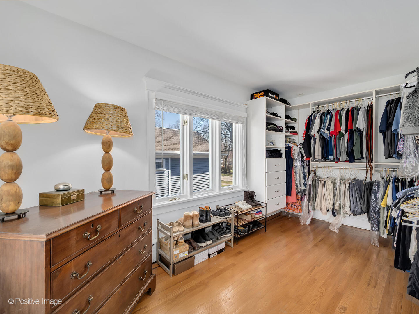 607 Willow Road Winnetka, IL 60093 - Photo 21 of 51 a bed room with a bed and a window