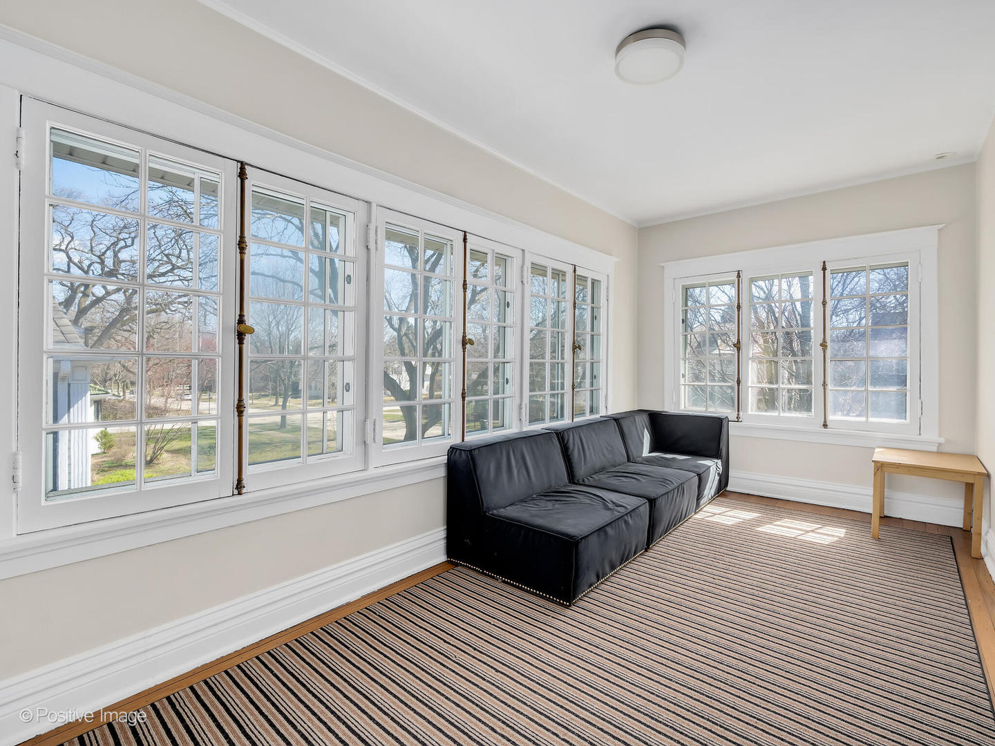 607 Willow Road Winnetka, IL 60093 - Photo 24 of 51 a living room with furniture and a large window