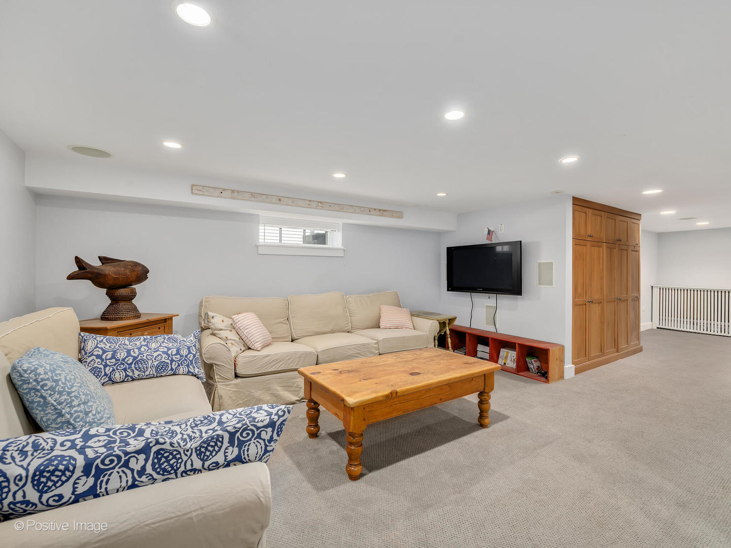 607 Willow Road Winnetka, IL 60093 - Photo 37 of 51 a living room with furniture and a flat screen tv