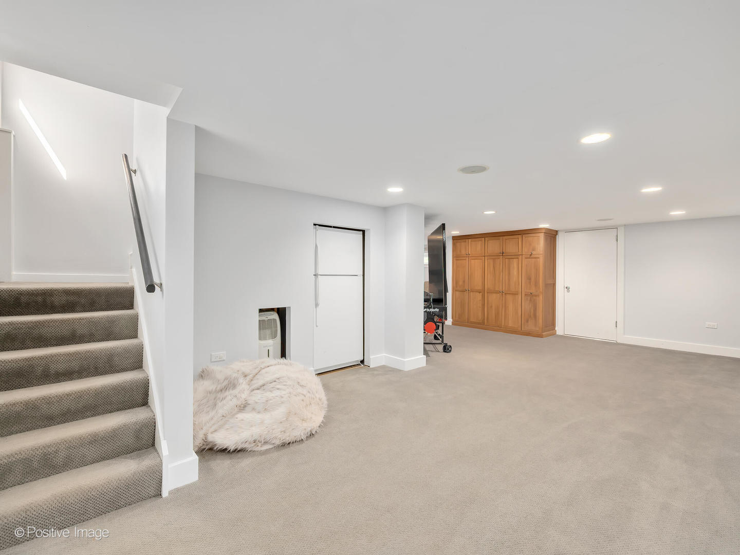 607 Willow Road Winnetka, IL 60093 - Photo 38 of 51 a view of an empty room with a fireplace