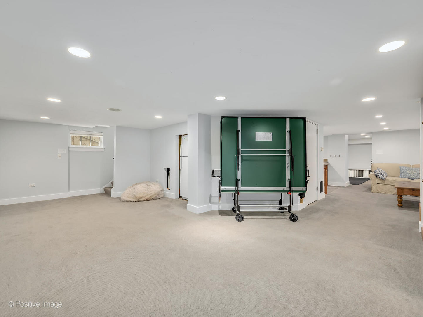 607 Willow Road Winnetka, IL 60093 - Photo 39 of 51 a view of a livingroom with a furniture and floor to ceiling window