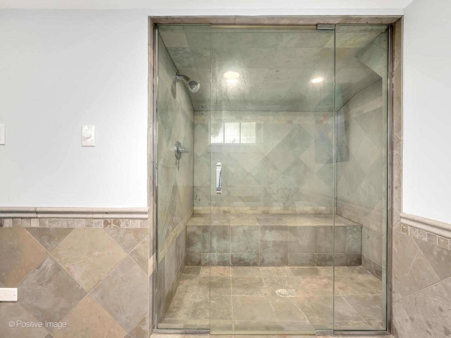 607 Willow Road Winnetka, IL 60093 - Photo 44 of 51 a bathroom with a shower