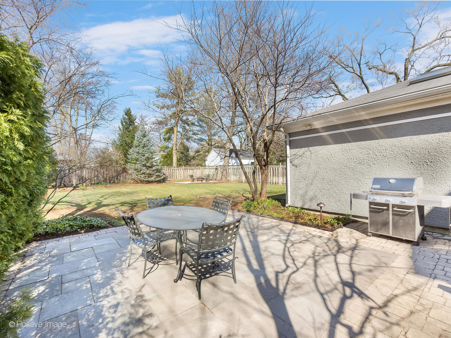 607 Willow Road Winnetka, IL 60093 - Photo 46 of 51 a view of backyard with swimming pool and furniture