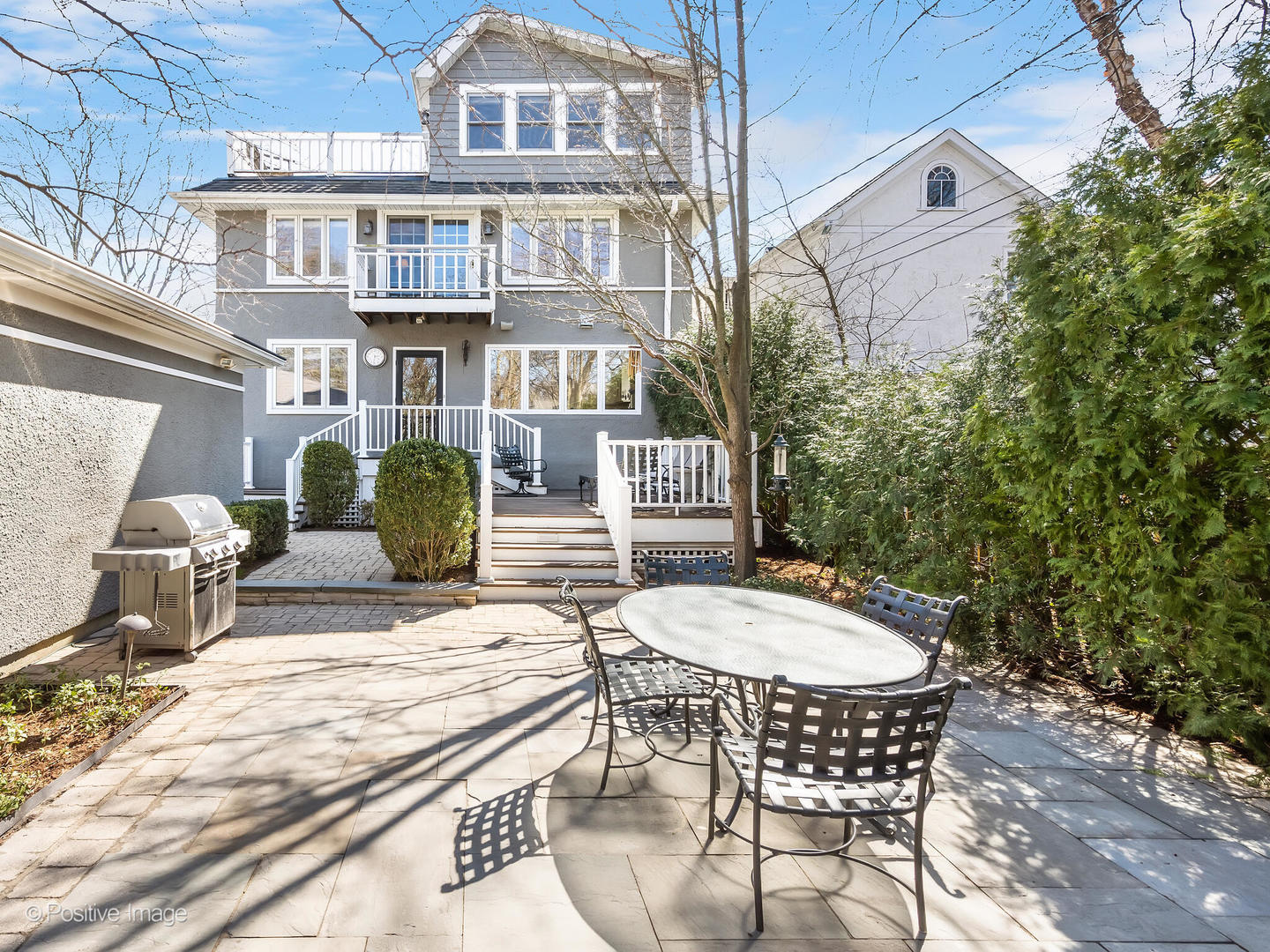 607 Willow Road Winnetka, IL 60093 - Photo 47 of 51 a view of a patio with table and chairs and potted plants