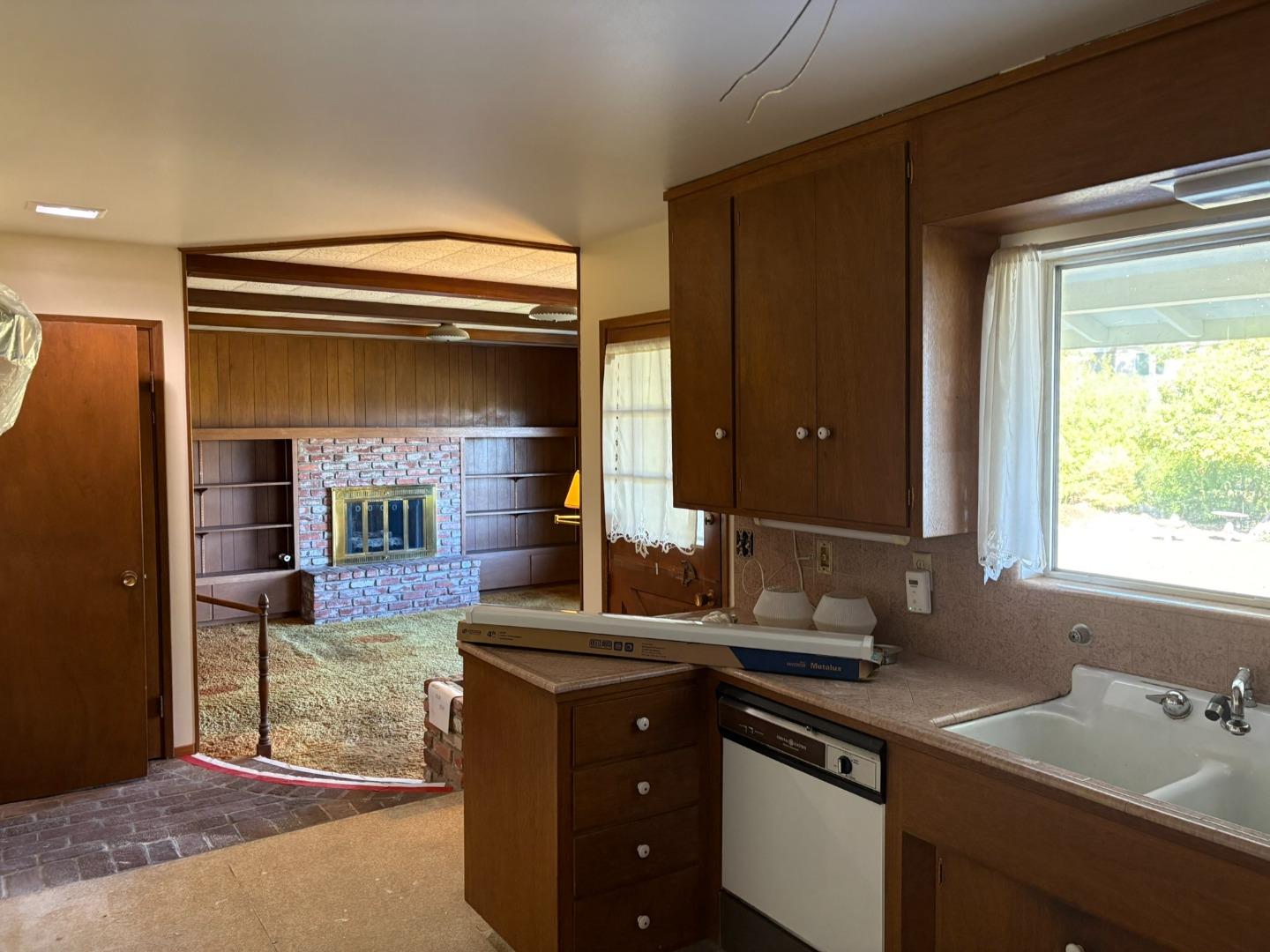 12130 Foothill Lane Los Altos Hills, CA 94022 - Photo 7 of 13 a kitchen with sink and window
