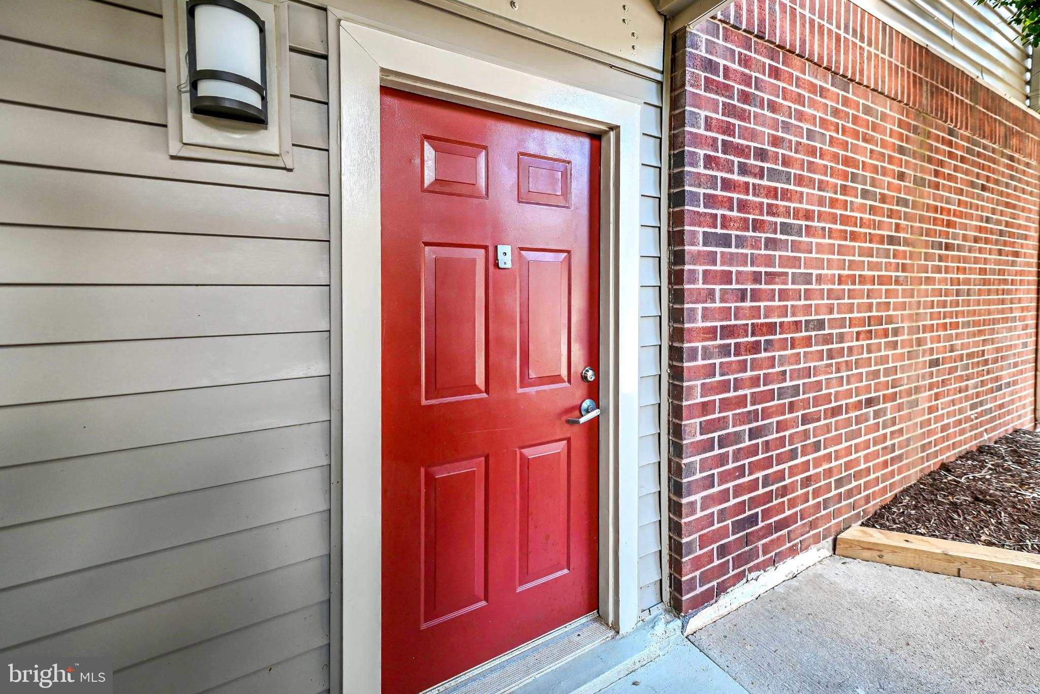 1706 Ascot Way, Unit B Reston, VA 20190 - Photo 2 of 14 a view of front door