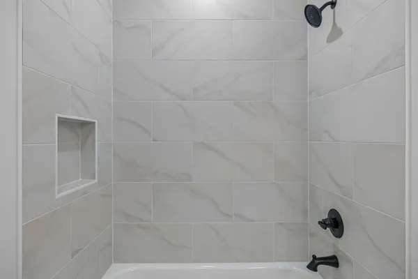 a bathroom with a sink toilet and mirror