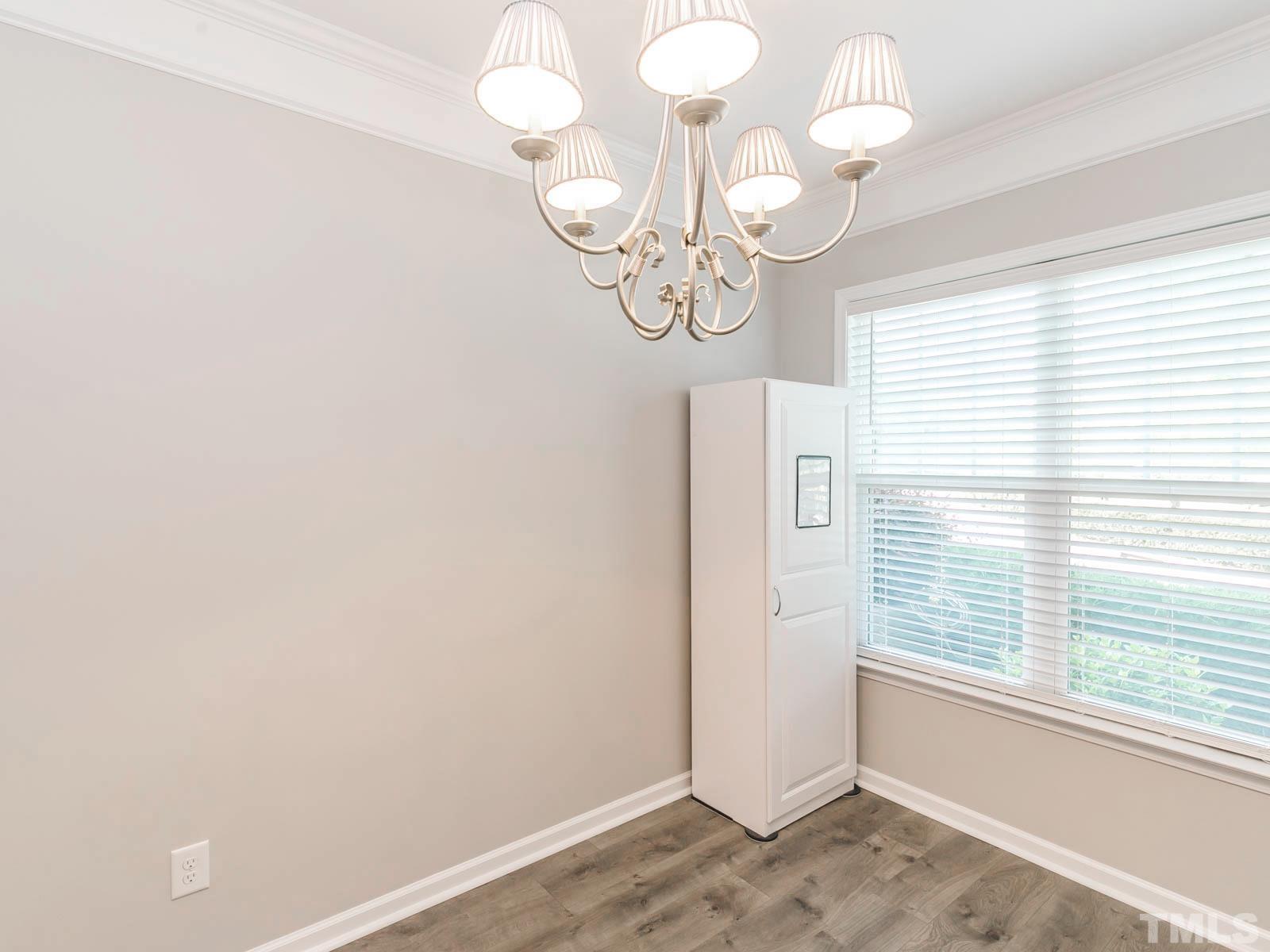 131 Deacon Ridge Street Wake Forest, NC 27587 - Photo 8 of 12 a view of a livingroom with the window