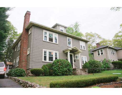 71-73 Athelstane Road, Unit 1 Newton, MA 02459 - Photo 3 of 16 a front view of a house with a yard