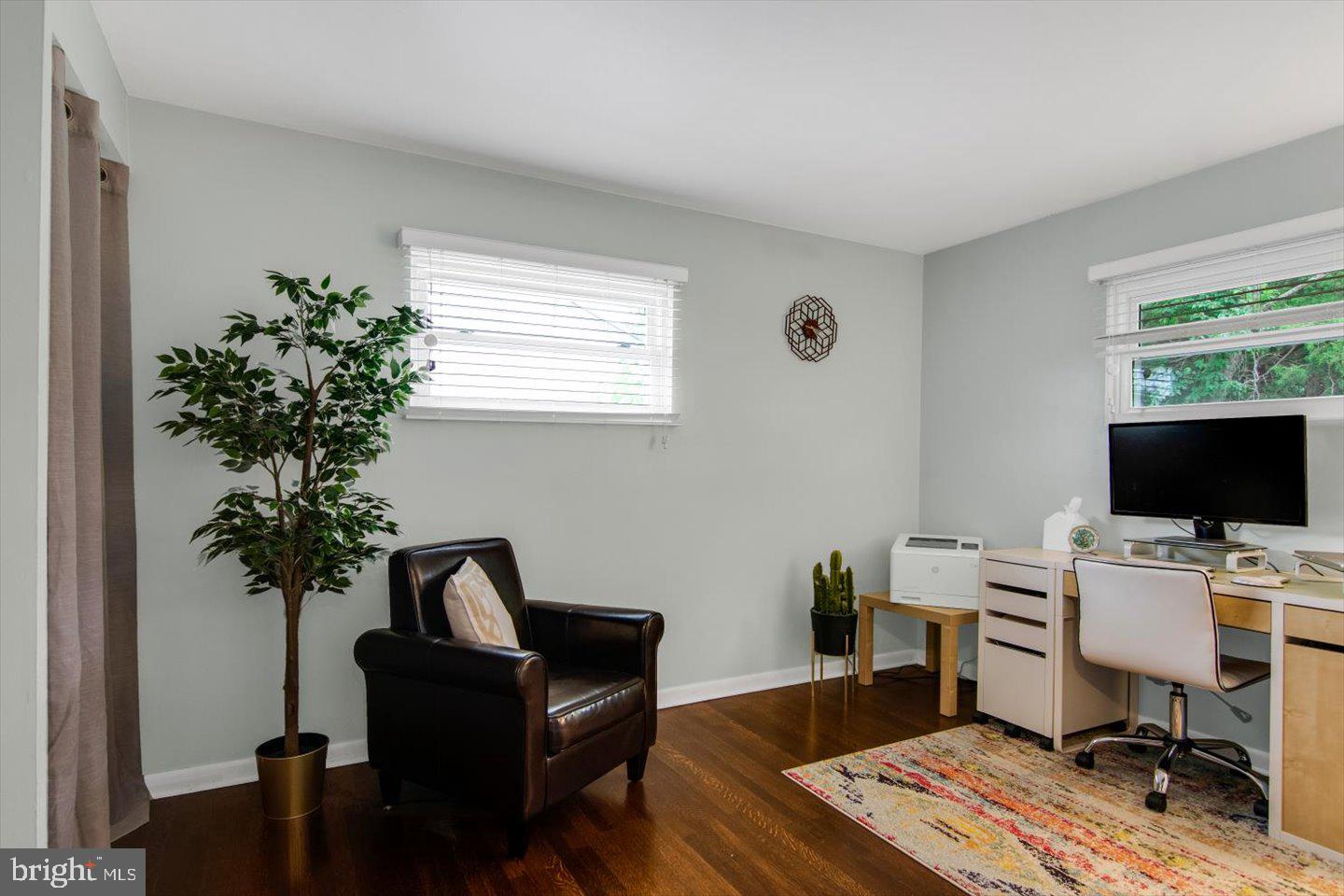417 Dickinson Road Glassboro, NJ 08028 - Photo 16 of 36 a view of a workspace with furniture and a window