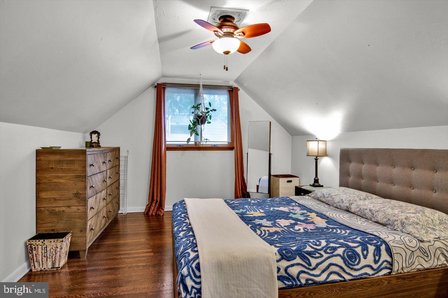 417 Dickinson Road Glassboro, NJ 08028 - Photo 20 of 36 a bedroom with a bed and a chandelier