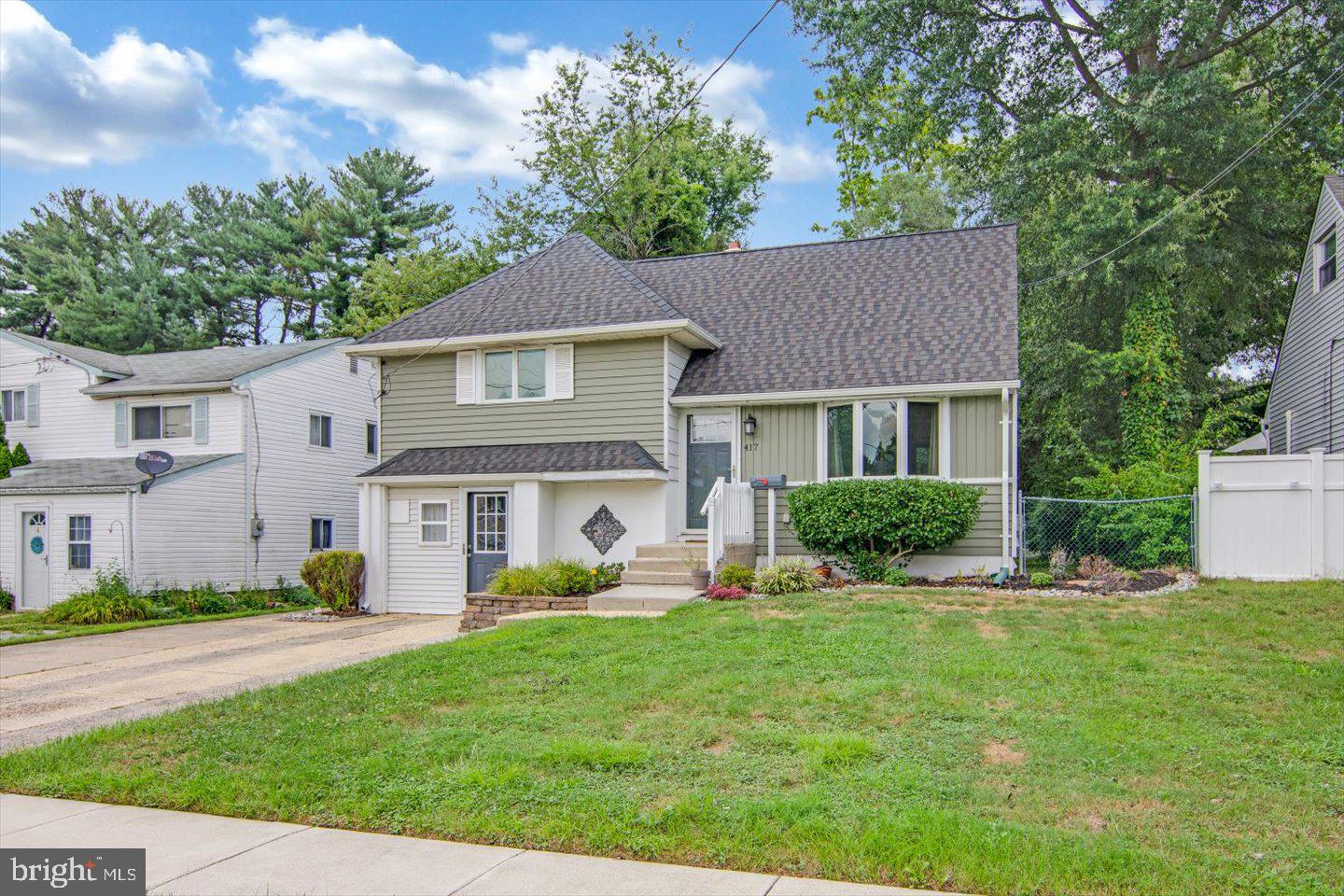 417 Dickinson Road Glassboro, NJ 08028 - Photo 3 of 36 a front view of a house with a yard