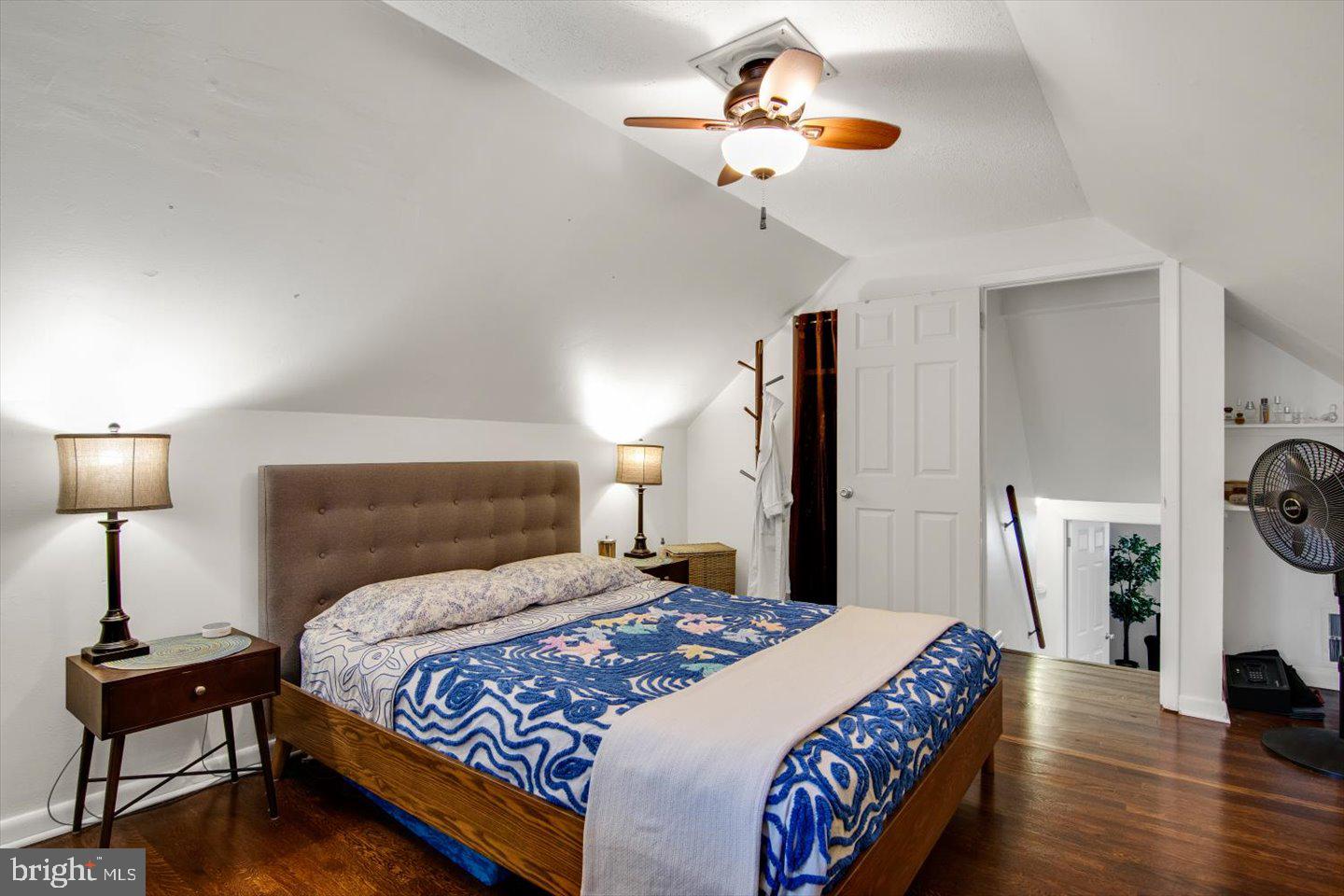 417 Dickinson Road Glassboro, NJ 08028 - Photo 21 of 36 a bedroom with a bed a chandelier and a dresser