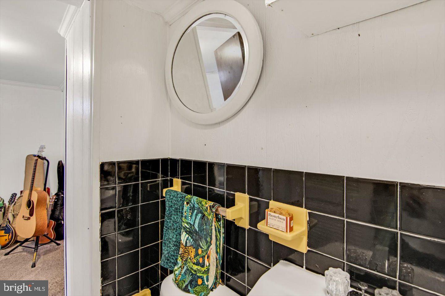 417 Dickinson Road Glassboro, NJ 08028 - Photo 22 of 36 a bathroom with a toilet a sink and shower