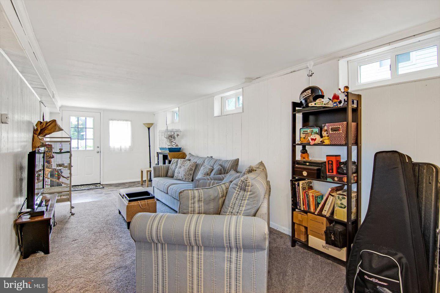 417 Dickinson Road Glassboro, NJ 08028 - Photo 23 of 36 a living room with furniture and gym equipment