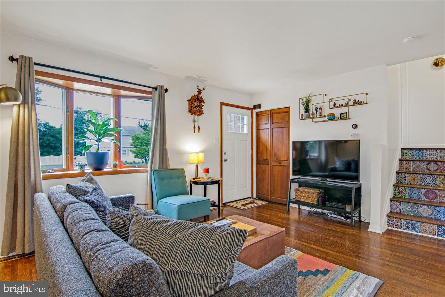 417 Dickinson Road Glassboro, NJ 08028 - Photo 6 of 36 a living room with furniture and a flat screen tv