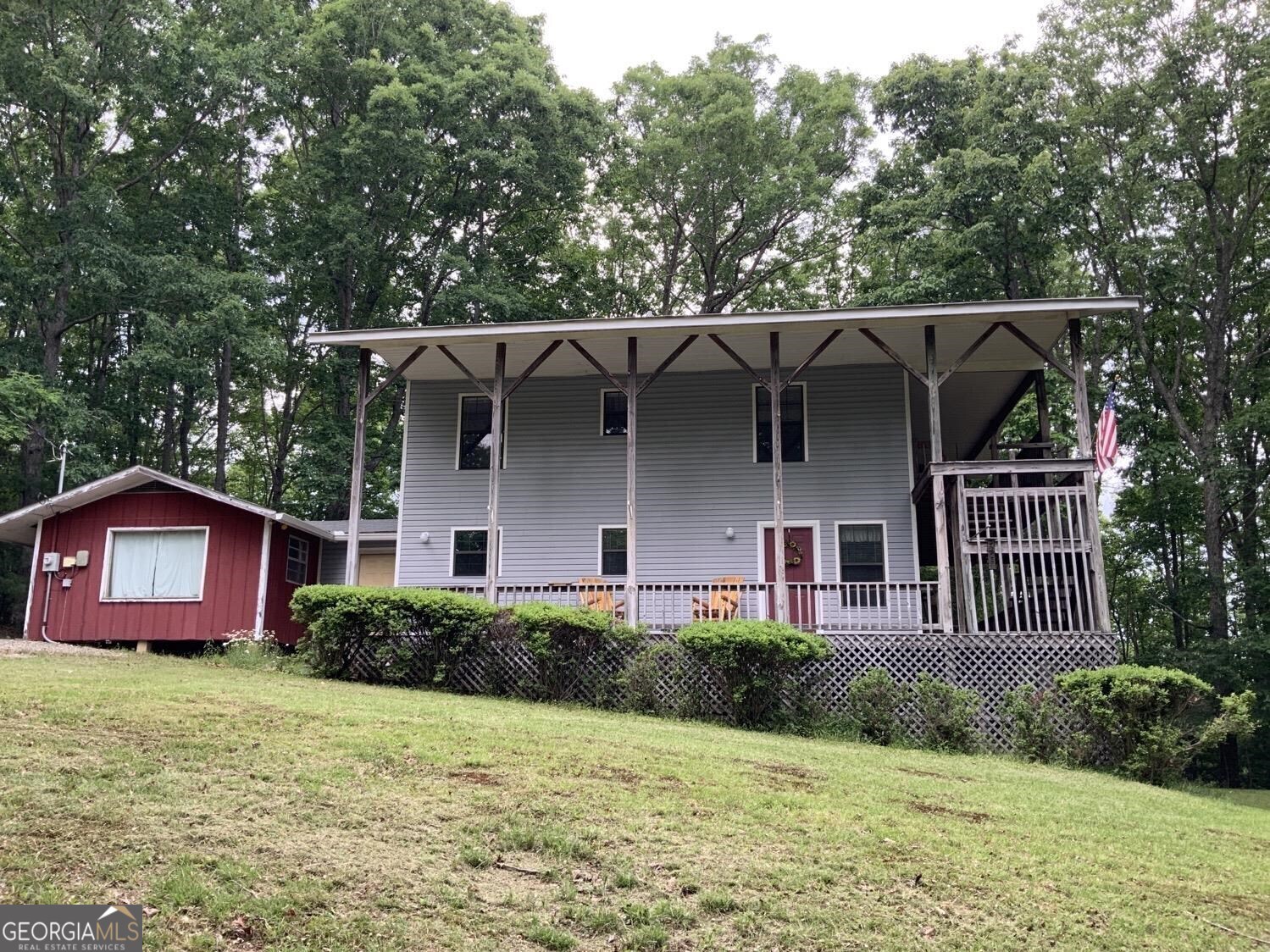 277 Hamilton Road Blairsville, GA 30512 - Photo 1 of 27 a front view of a house with garden