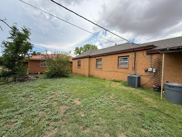 a view of a backyard with a garden