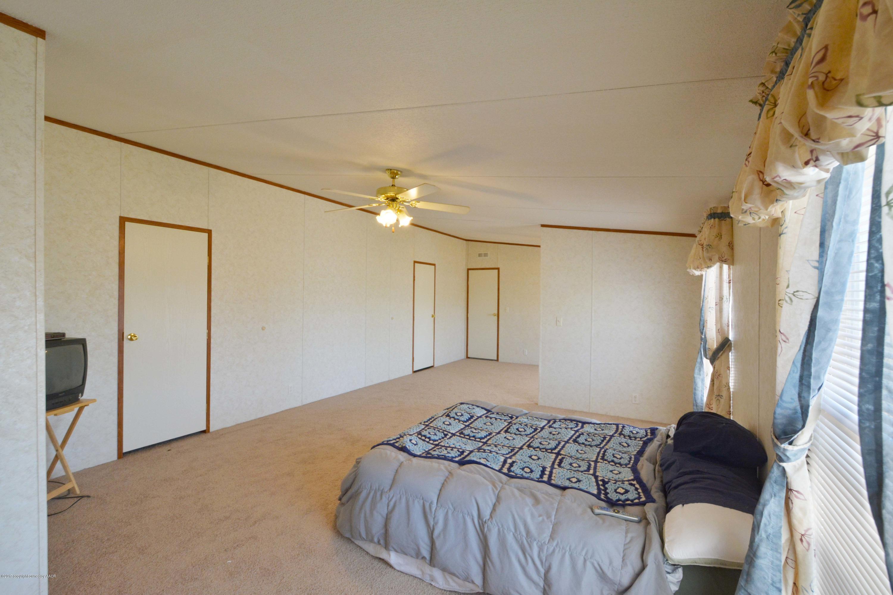 7440 Buckskin Road Amarillo, TX 79124 - Photo 12 of 25 12 Master Bedroom