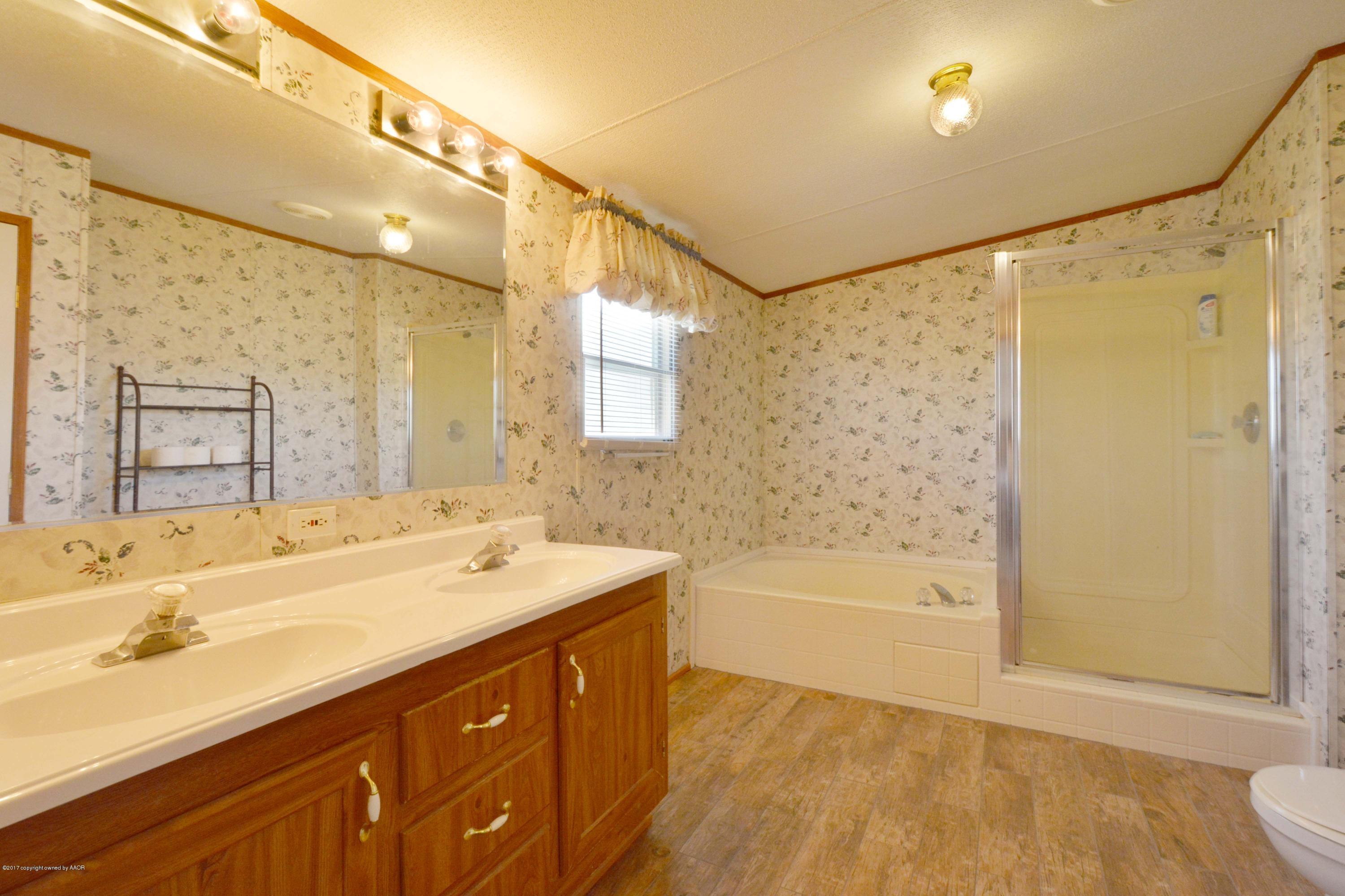 7440 Buckskin Road Amarillo, TX 79124 - Photo 13 of 25 13 Master Bathroom