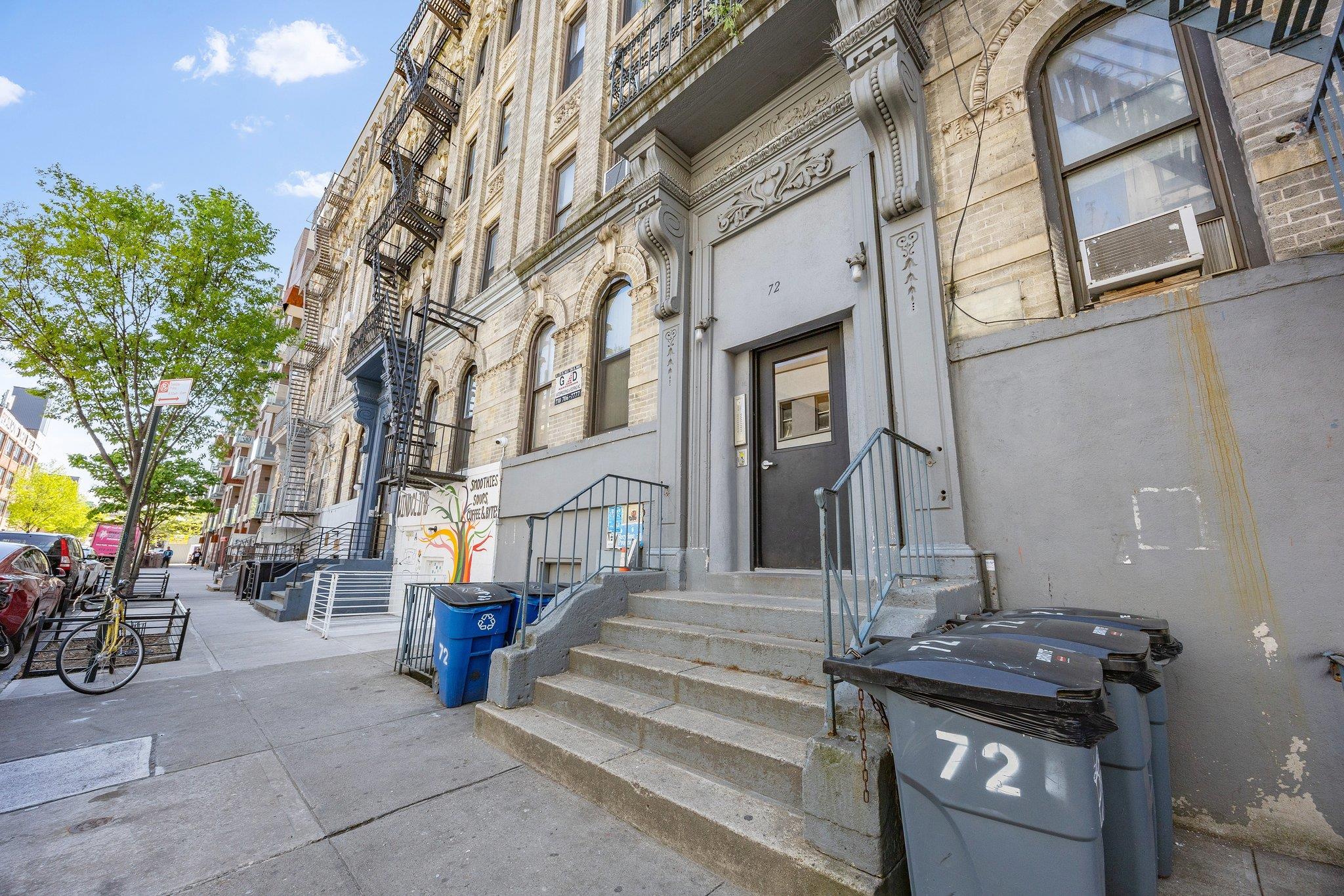72 Richardson Street, Unit 4 Brooklyn, NY 11211 - Photo 16 of 17 Property entrance with cooling unit and stone siding
