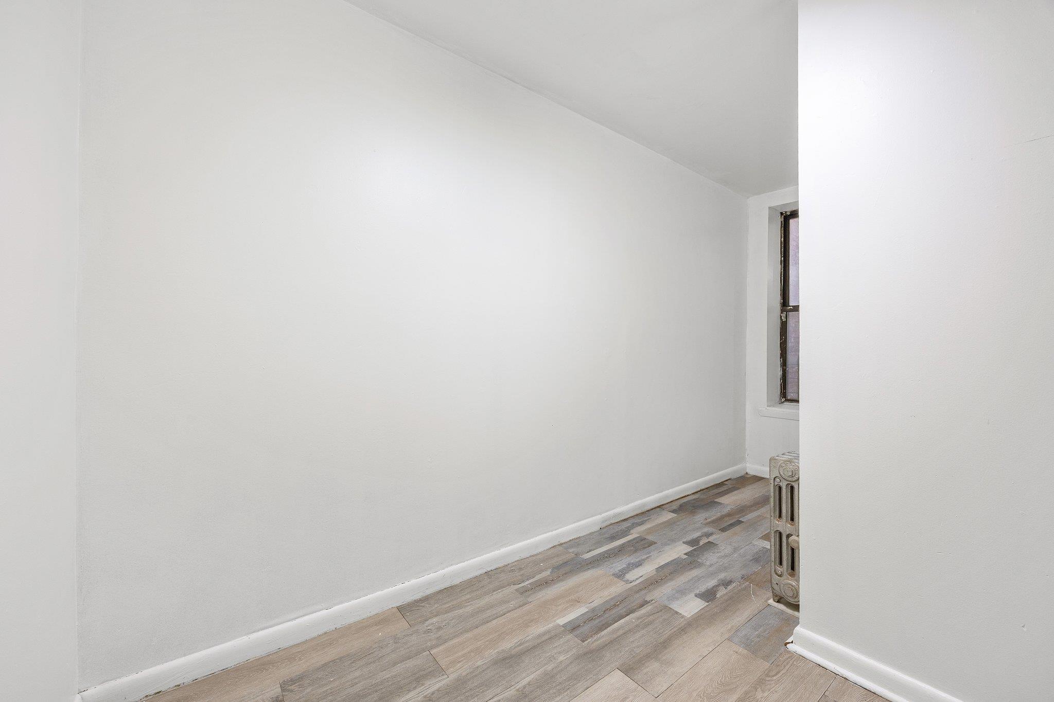 72 Richardson Street, Unit 4 Brooklyn, NY 11211 - Photo 7 of 17 Empty room with baseboards and light wood finished floors