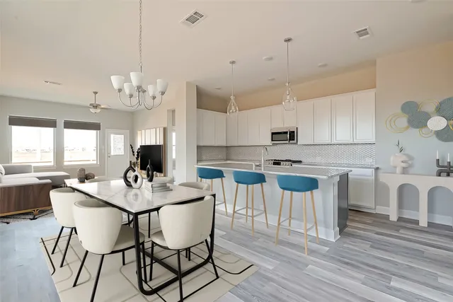 a view of kitchen with breakfast area