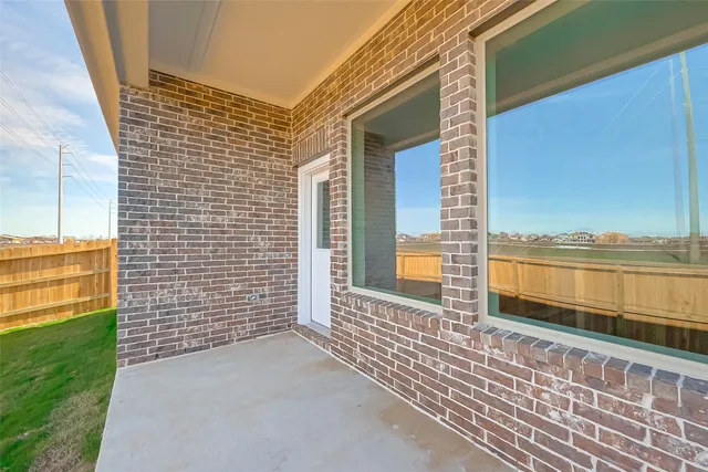 a view of a balcony with an ocean view