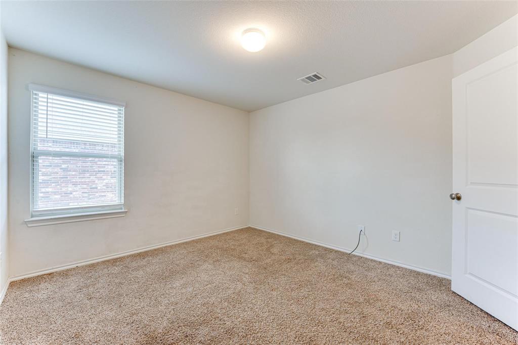 517 Milo Way Royse City, TX 75189 - Photo 15 of 34 Carpeted room with a single window featuring horizontal blinds