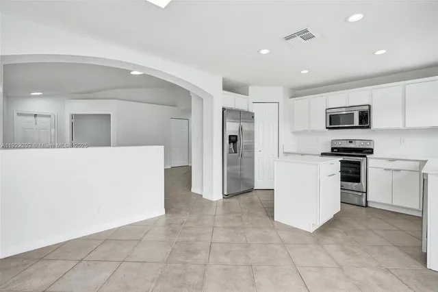 a view of a golf course with a garden