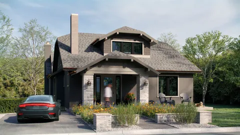 a front view of a house with garden