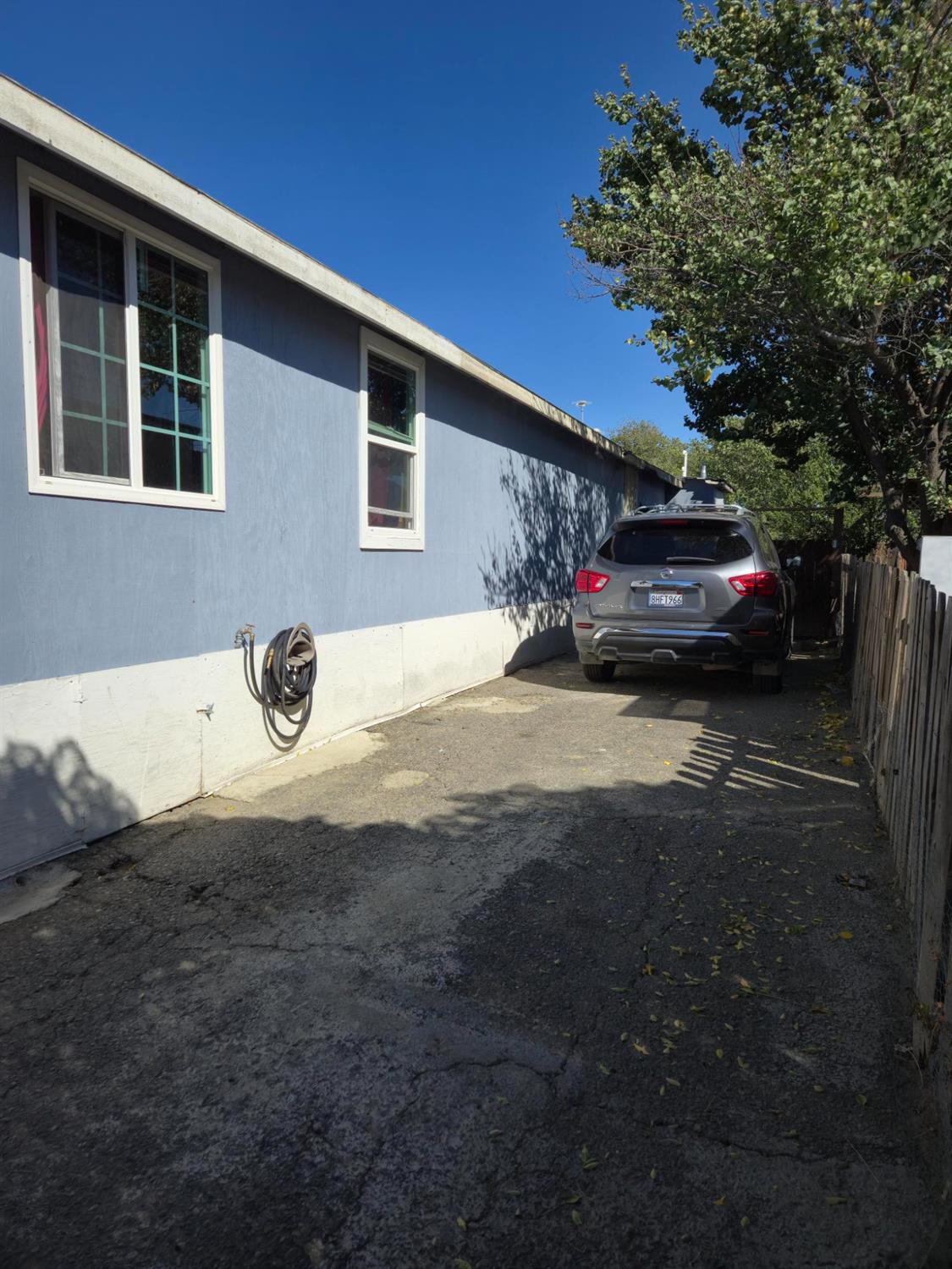 1284 Elizabeth Street, Unit 80 Coalinga, CA 93210 - Photo 21 of 24 a view of car parked in front of house