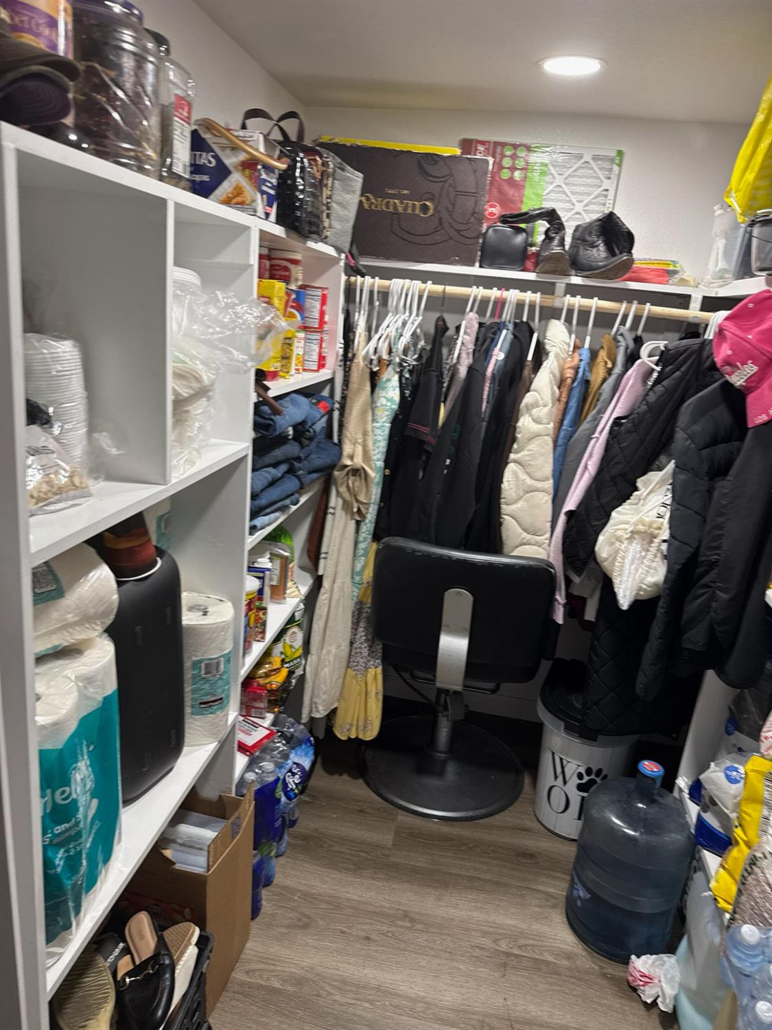 1284 Elizabeth Street, Unit 80 Coalinga, CA 93210 - Photo 23 of 24 a view of walk in closet with clothes and shoes