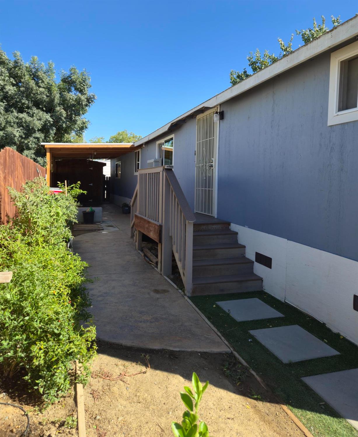 1284 Elizabeth Street, Unit 80 Coalinga, CA 93210 - Photo 3 of 24 a view of a house with a yard