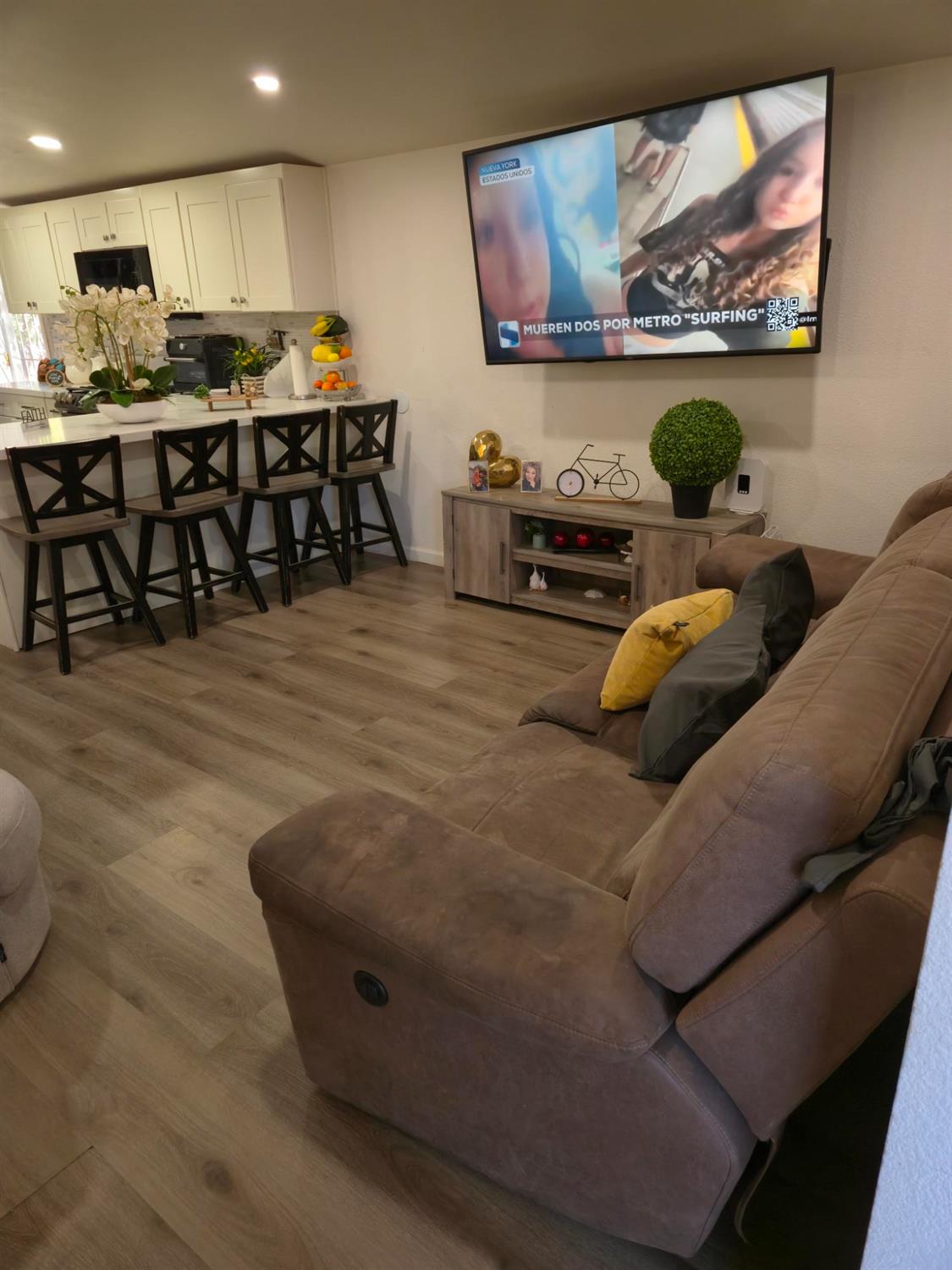 1284 Elizabeth Street, Unit 80 Coalinga, CA 93210 - Photo 4 of 24 a living room with stainless steel appliances furniture and a kitchen view