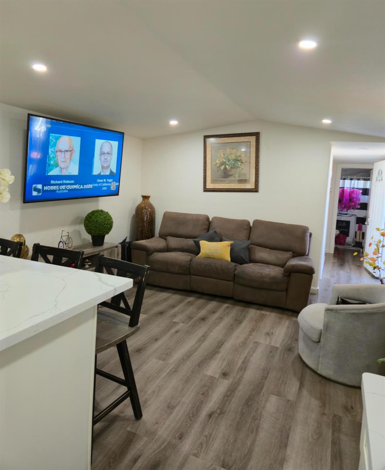 1284 Elizabeth Street, Unit 80 Coalinga, CA 93210 - Photo 5 of 24 a living room with furniture and a wooden floor