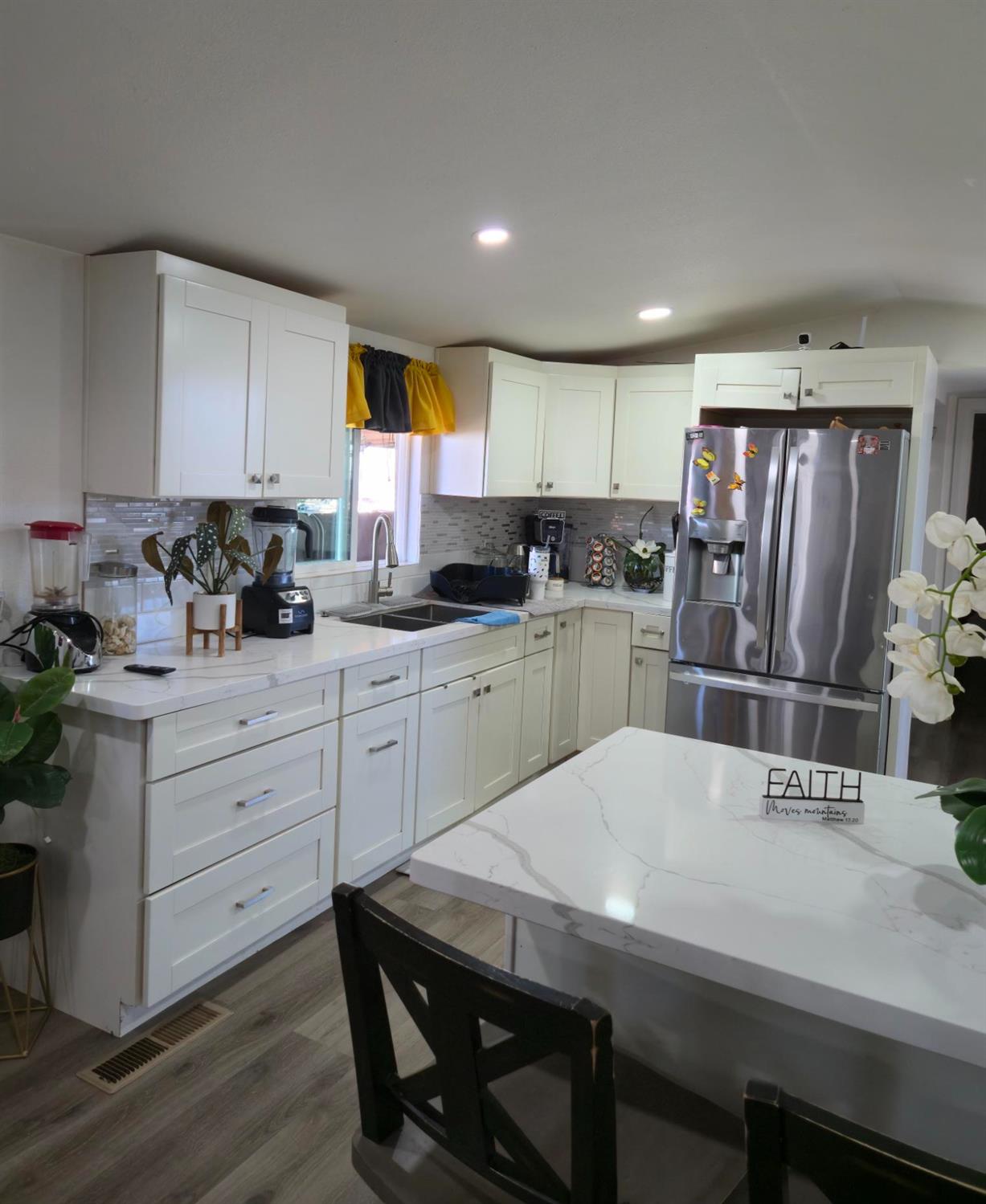 1284 Elizabeth Street, Unit 80 Coalinga, CA 93210 - Photo 8 of 24 a kitchen with granite countertop a sink appliances cabinets and counter space