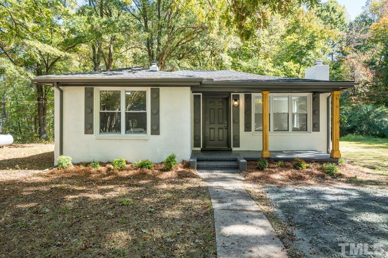 a view of a house with a garden