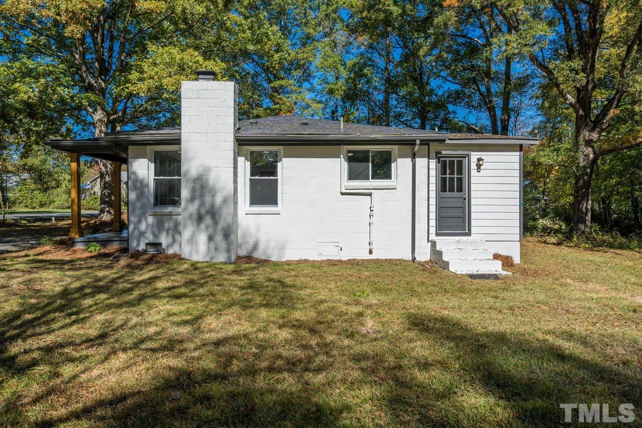 305 School House Road Efland, NC 27243 - Photo 11 of 35 a view of a house with a tree in the background