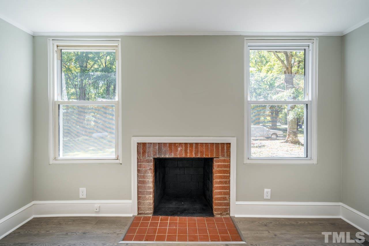 305 School House Road Efland, NC 27243 - Photo 19 of 35 a living room with furniture and a fireplace